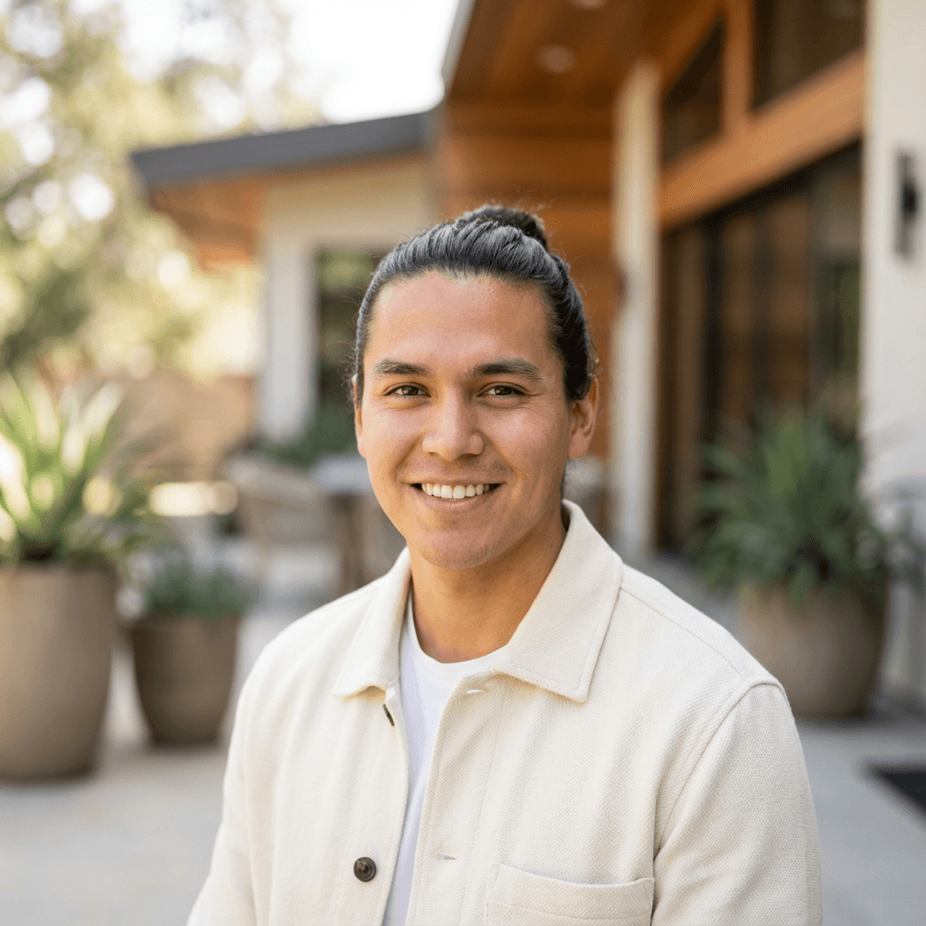 Male property owner standing outside a rental home